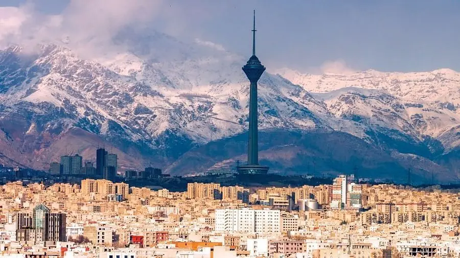 Tehran skyline with Milad Tower and the Alborz Mountains